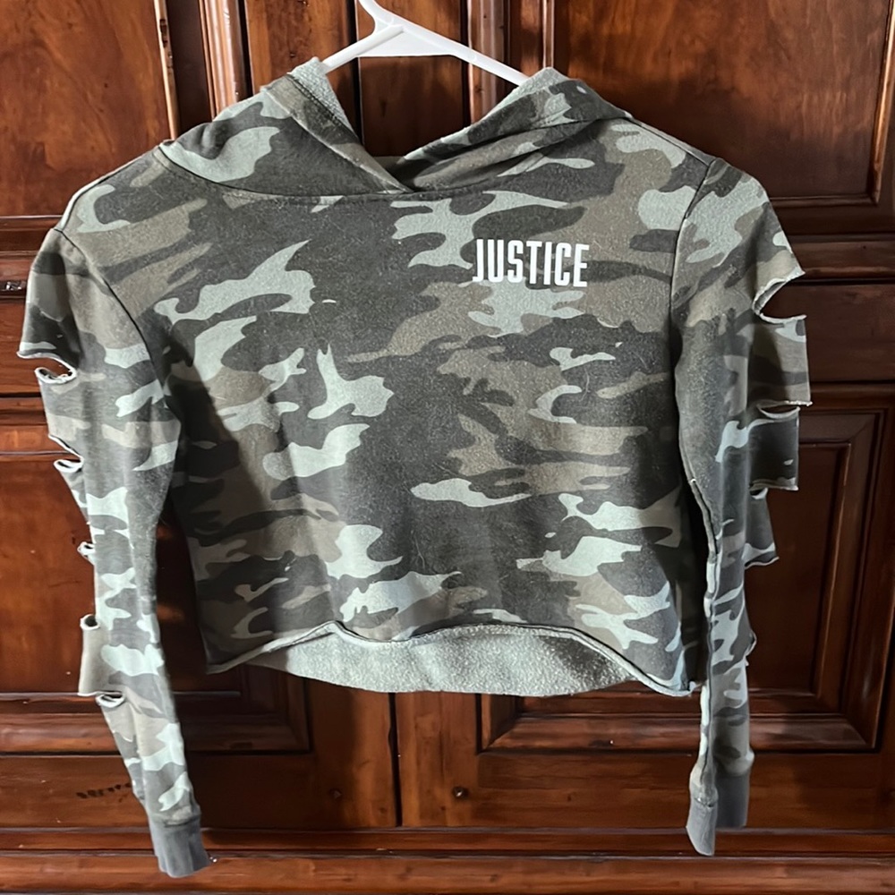 Cropped hoodie with ripped holes.
